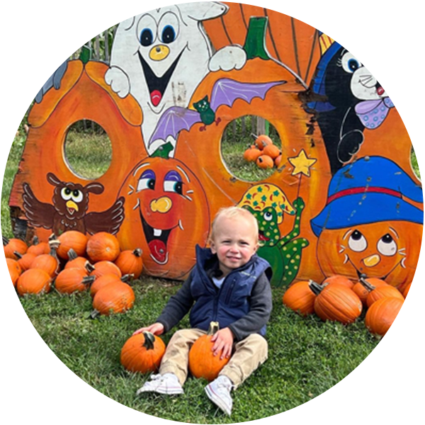 cute baby with pumpkins